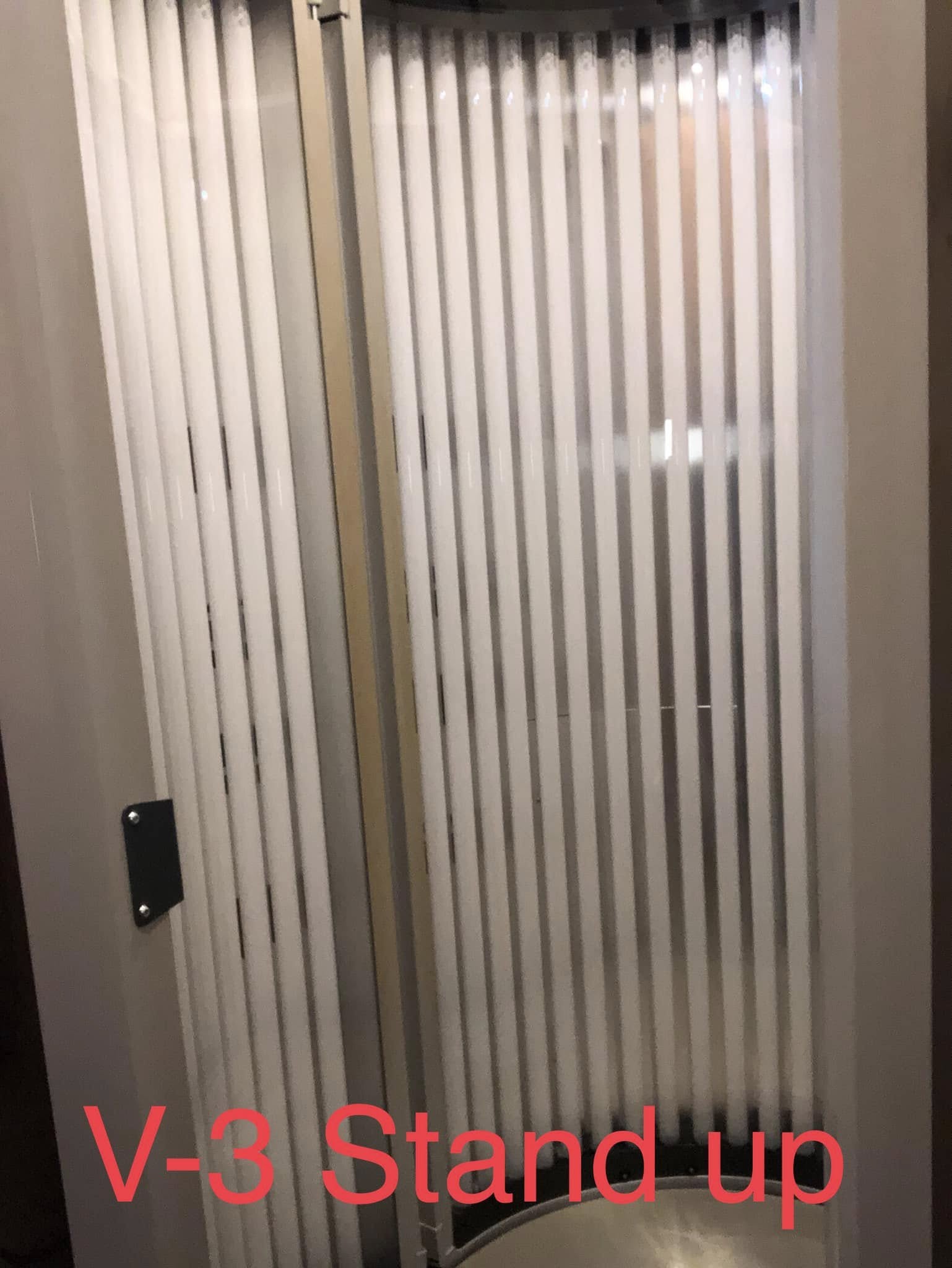 V-3 stand-up tanning bed at Almost Paradise Tanning